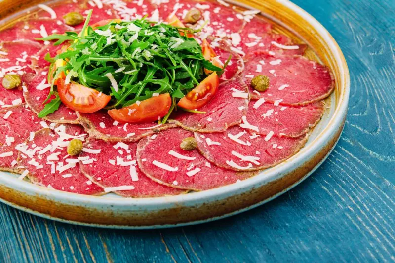 beef carpaccio with capers parmesan